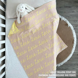 TinyBitz Personalized name blanket in oatmeal and light yellow, perfect gift for newborn babies.