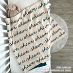 TinyBitz knitted name blanket in oatmeal and teal can be used to decorate your baby's room!