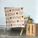 Personalized blanket with couple's name knitted in oatmeal and rust made by TinyBitz.