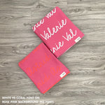 TinyBitz knitted name blanket in rose pink background can be used to decorate your baby's room!
