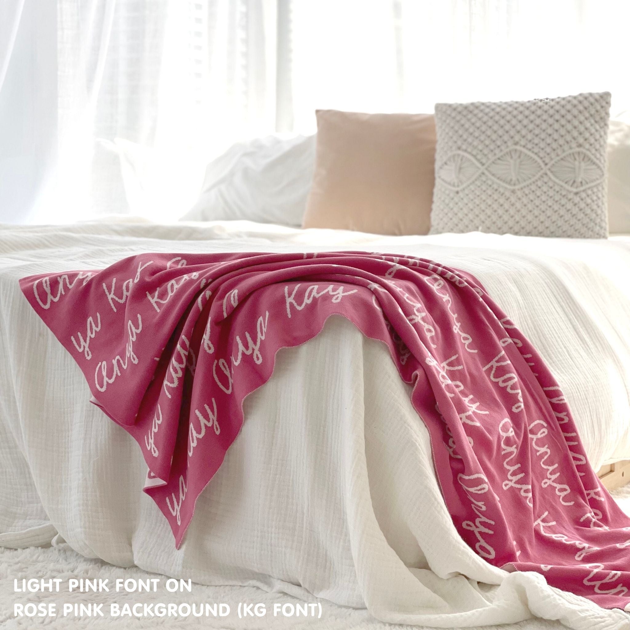 Customisable bed throw and blanket with your own name knitted in rose pink and light pink, made by TinyBitz!