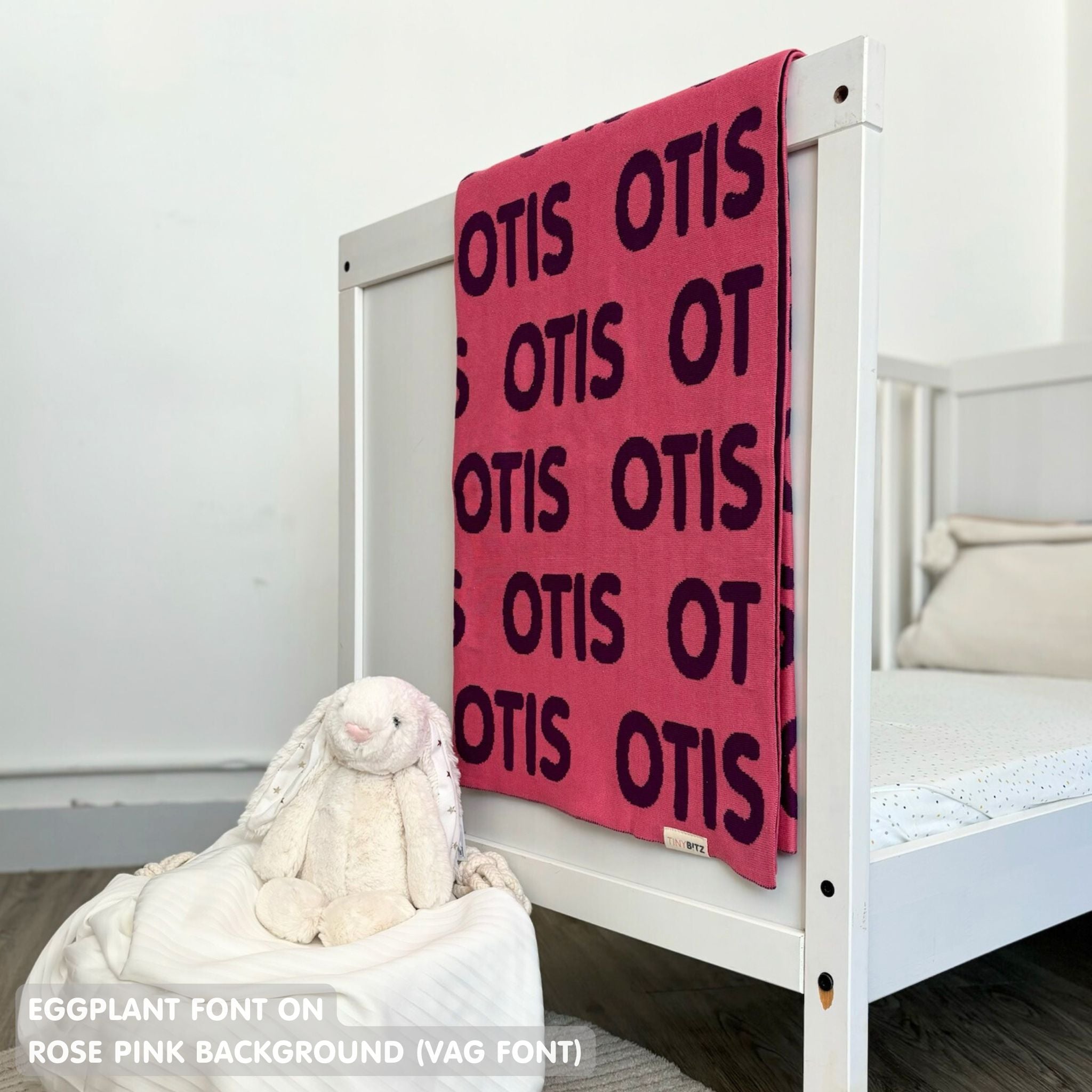 TinyBitz Personalized baby knitted name blanket in rose pink and eggplant, making the best baby shower gift!