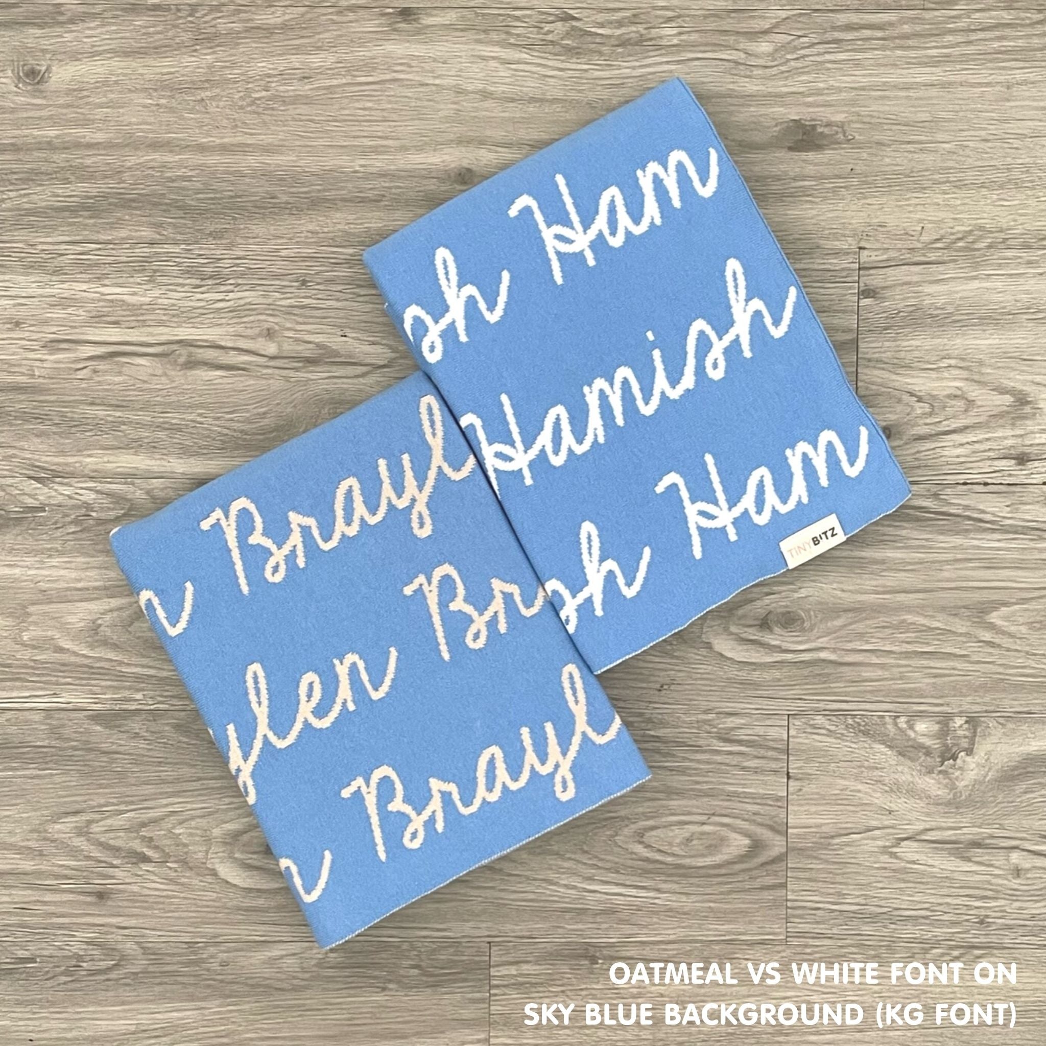 TinyBitz custom name blanket with couple's name knitted in sky blue, making the perfect wedding or anniversary gift!