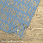 Custom cotton blanket as a gift for him, knitted in sky blue and light grey by TinyBitz.