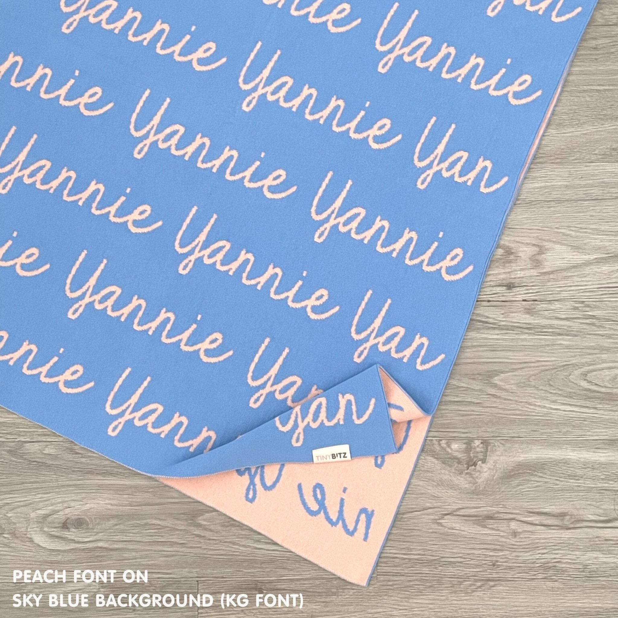 TinyBitz knitted cotton blanket in sky blue and peach, personalised with your own name!
