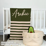 Knitted baby blanket in army green and oatmeal with a stripes pattern, customised with baby's name, made by TinyBitz.