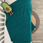 TinyBitz knitted name blanket in teal background, one colour with monogram, can be used to decorate your baby's room!