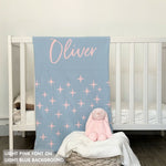 TinyBitz personalized baby name blanket, knitted in light blue and light pink with a twinkles pattern, perfect baby shower gift!