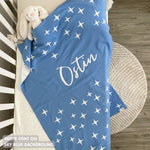 TinyBitz custom knitted blanket with baby's name on sky blue background with a twinkles pattern, best gift to welcome a newborn baby.