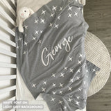 Knitted baby blanket in light grey and white with a twinkles pattern, customised with baby's name, made by TinyBitz.