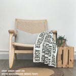 Knitted baby blanket in white and army green, customised with baby's name, made by TinyBitz.