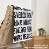TinyBitz Personalized baby knitted name blanket in white and charcoal, making the best baby shower gift!