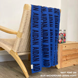 Custom cotton blanket for boys in blue and navy, personalized by TinyBitz.