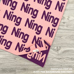 Cotton Kids Blanket with name knitted in dusty pink and eggplant, made by TinyBitz.