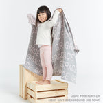 TinyBitz Kids Blanket in light grey and light pink, personalized with child's name and made from 100% cotton.