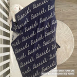 Cotton Kids Blanket with name knitted in navy and light grey, made by TinyBitz.