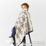 TinyBitz Personalized kids knitted name blanket in oatmeal and charcoal, perfect as a birthday gifts for kids!