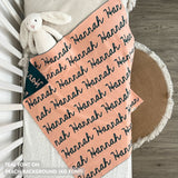 TinyBitz Kids Blanket in peach and teal, personalized with child's name and made from 100% cotton.