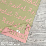TinyBitz Kids Blanket in sage and dusty pink, personalized with child's name and made from 100% cotton.
