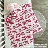 Cotton Kids Blanket with name knitted in white and rose pink, made by TinyBitz.