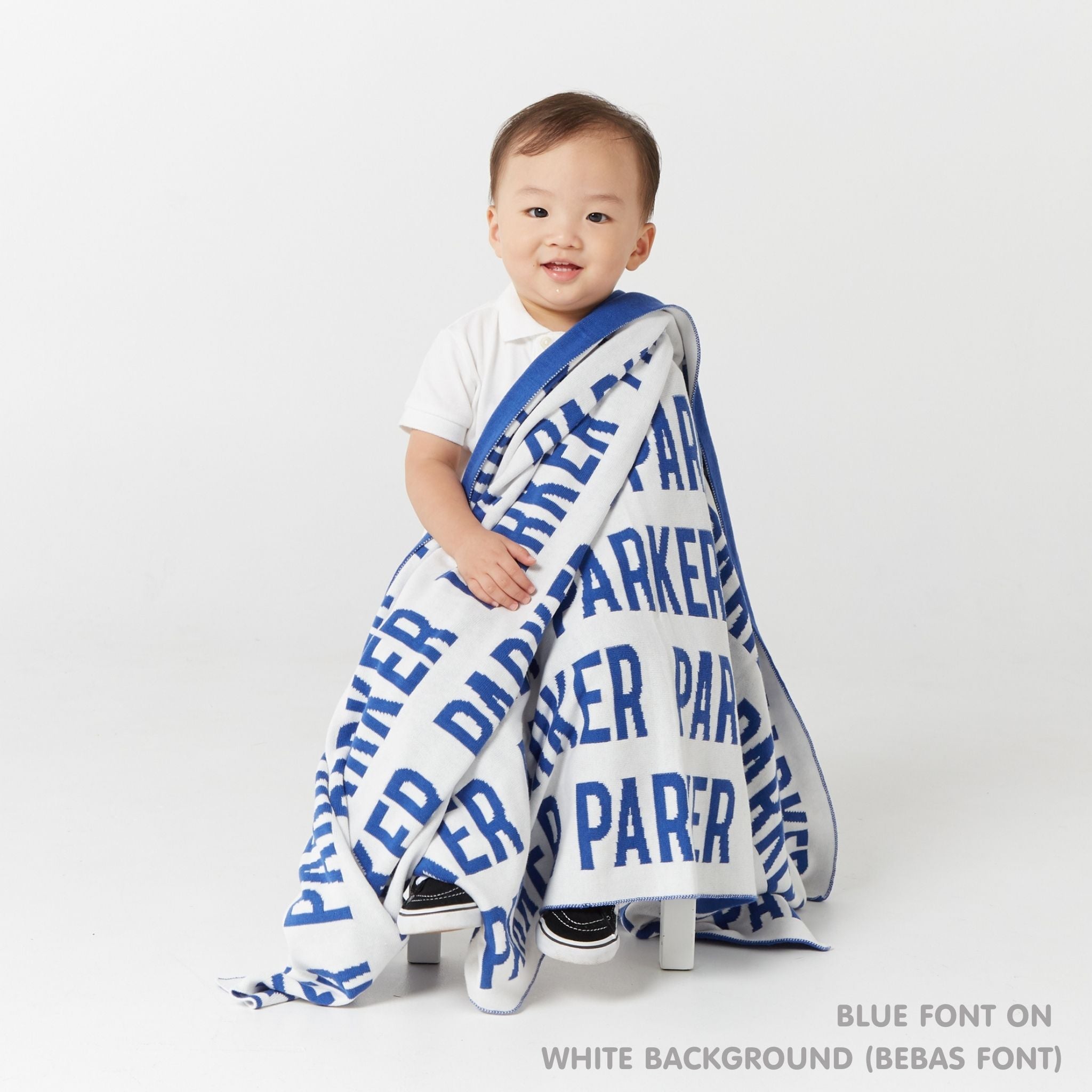 TinyBitz Kids Blanket in white and blue, personalized with child's name and made from 100% cotton.