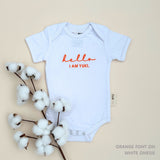 Custom name onesie in white, personalised baby clothing made with soft breathable fabric by TinyBitz.