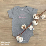 Custom name onesie in grey, personalised baby clothing made with soft breathable fabric by TinyBitz.