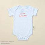 TinyBitz Personalised baby onesie with embroidered name in soft white cotton, perfect for birth announcements and newborn photos.