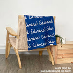 Personalised pet blanket in blue and white knitted cotton, custom knitted dog blanket by TinyBitz, perfect gift for dog lovers.