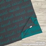 Personalised pet blanket in charcoal and teal knitted cotton, custom knitted dog blanket by TinyBitz, perfect gift for dog lovers.