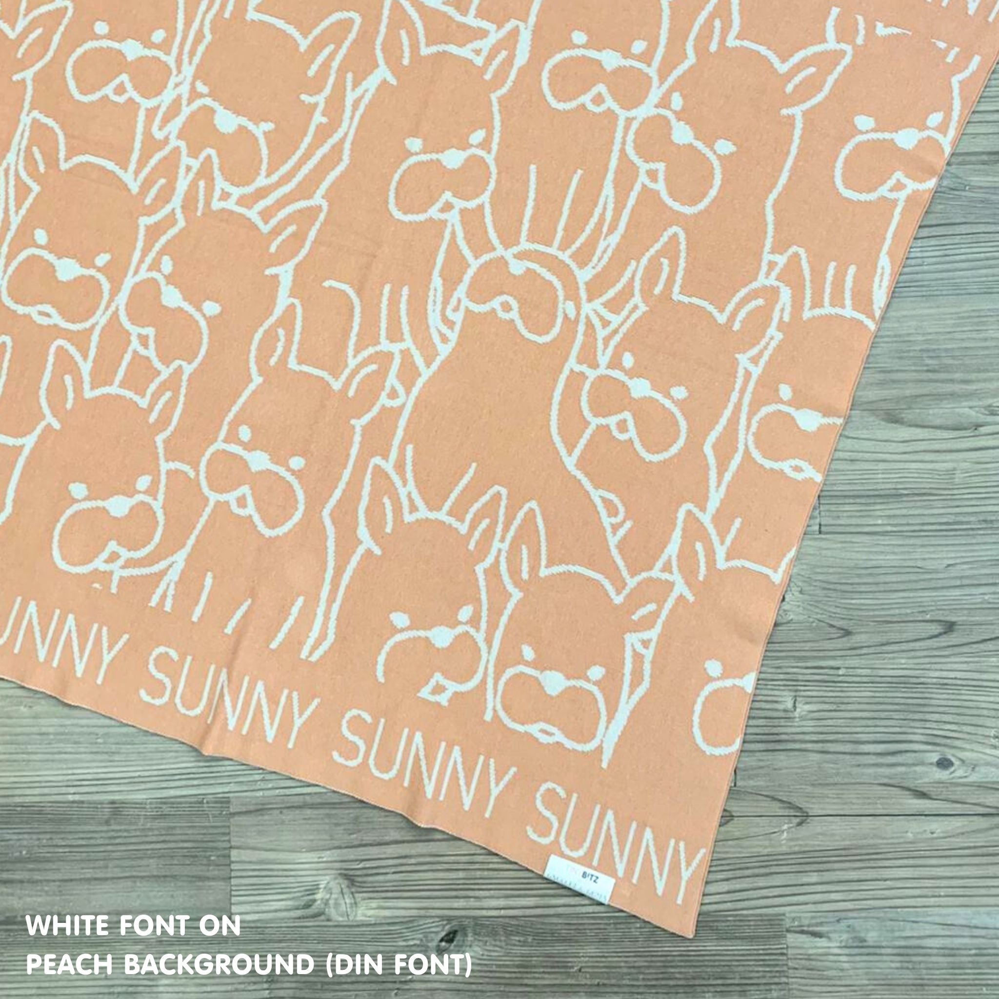 Personalised pet blanket in peach and white knitted cotton, cozy custom dog blanket by TinyBitz, perfect personalized gift for pet lovers.
