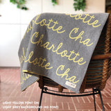 Personalised pet blanket in light grey and light yellow knitted cotton, cozy custom cat blanket by TinyBitz, perfect personalized gift for pet lovers.