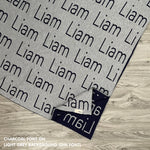 Personalised pet blanket with name Liam in light grey and charcoal, custom dog blanket by TinyBitz, cozy gift for dogs.
