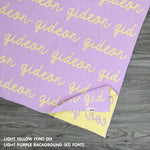 Personalised pet blanket with name Luka in light purple and light yellow, custom dog blanket by TinyBitz, cozy gift for dogs.
