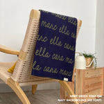 Personalised pet blanket in navy and army green knitted cotton, custom dog blanket by TinyBitz, styled on modern wooden dog bed.