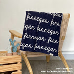 Personalised pet blanket in navy and white knitted cotton, custom knitted dog blanket by TinyBitz, perfect gift for dog lovers.