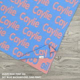 Personalised pet blanket for in sky blue and dusty pink knitted cotton, custom dog blanket by TinyBitz, styled on modern wooden dog bed.