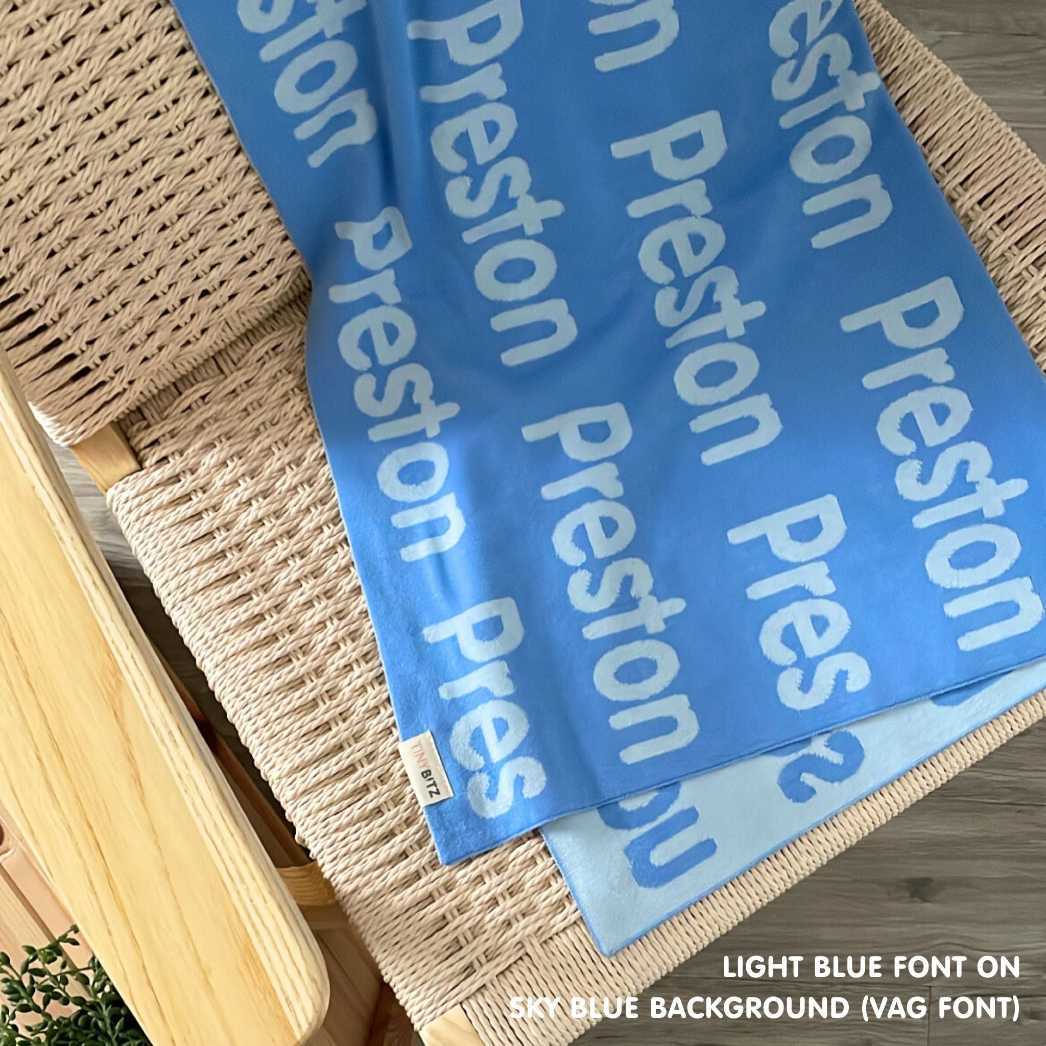 Personalised pet blanket in sky blue and light blue knitted cotton, cozy custom dog blanket by TinyBitz, perfect personalized gift for pet lovers.
