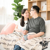 Personalized blanket with couple's name knitted in oatmeal and charcoal made by TinyBitz.