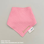 Neutral-toned personalised baby bib with minimalist name embroidery, custom made to order newborn gift by TinyBitz.