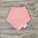 Custom baby bib in dusty pink with embroidered name, personalised baby gift made from breathable muslin by TinyBitz.