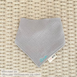 Organic personalised bib for babies in light grey, featuring baby name in script font, unique baby gift idea by TinyBitz.