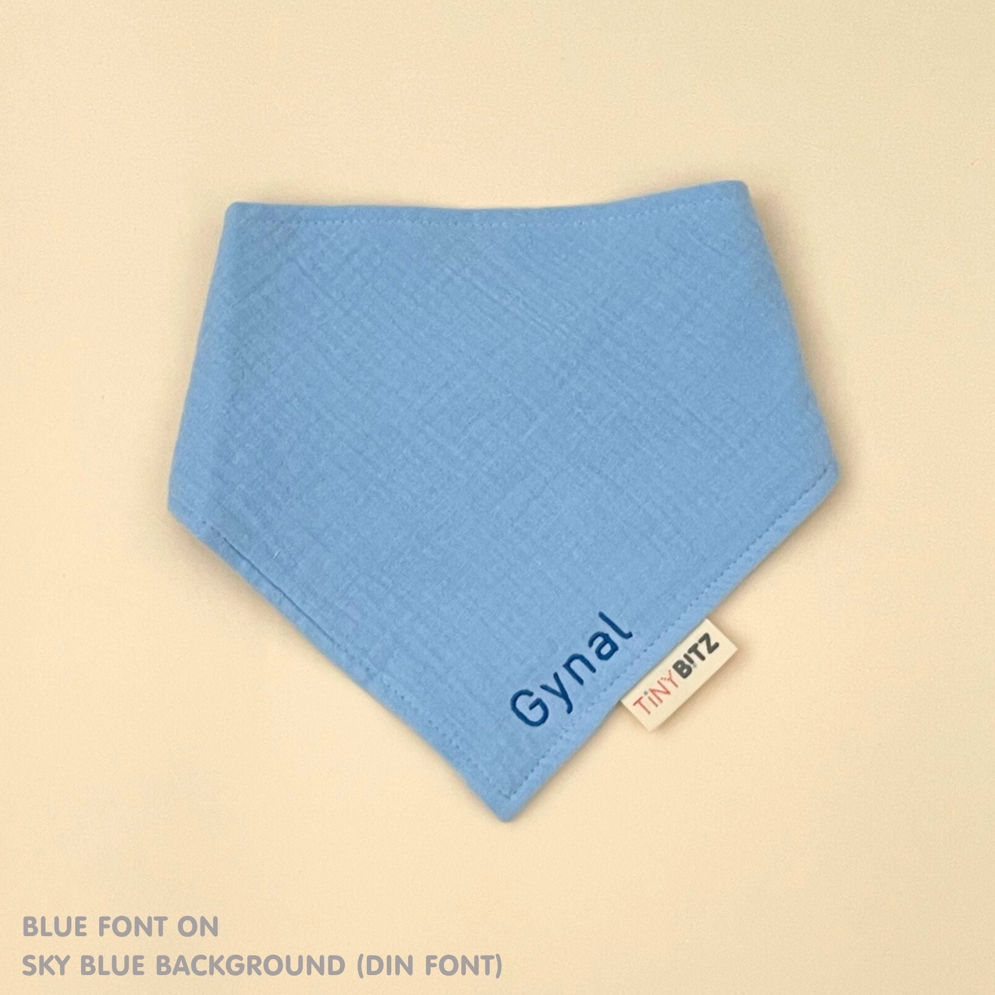 Organic cotton baby bib with name stitched on sky blue fabric, personalised baby gifts by TinyBitz.