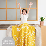 TinyBitz personalized name blanket in mustard and white with a confetti pattern, perfect gift for newborn babies and kids.