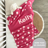 Knitted baby blanket in rose pink and light pink with a dot pattern, customised with baby's name, made by TinyBitz.