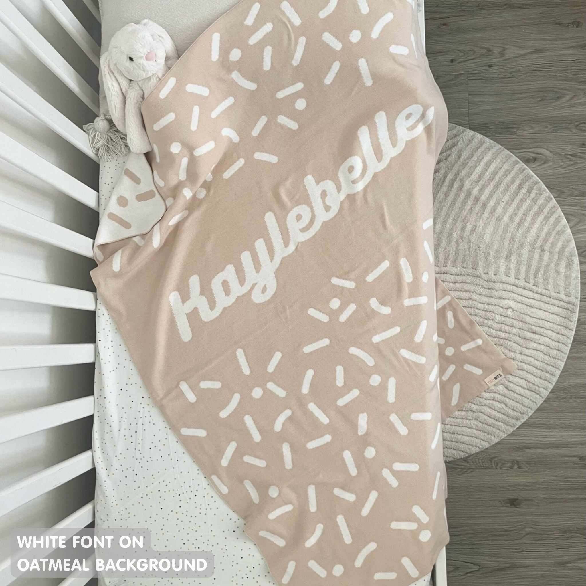 TinyBitz personalized baby knitted name blanket in oatmeal and white, perfect gift for birthdays and special occasions!