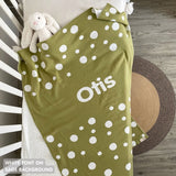 Cotton baby blanket with baby's name, knitted in sage and white with a dot pattern, made by TinyBitz.