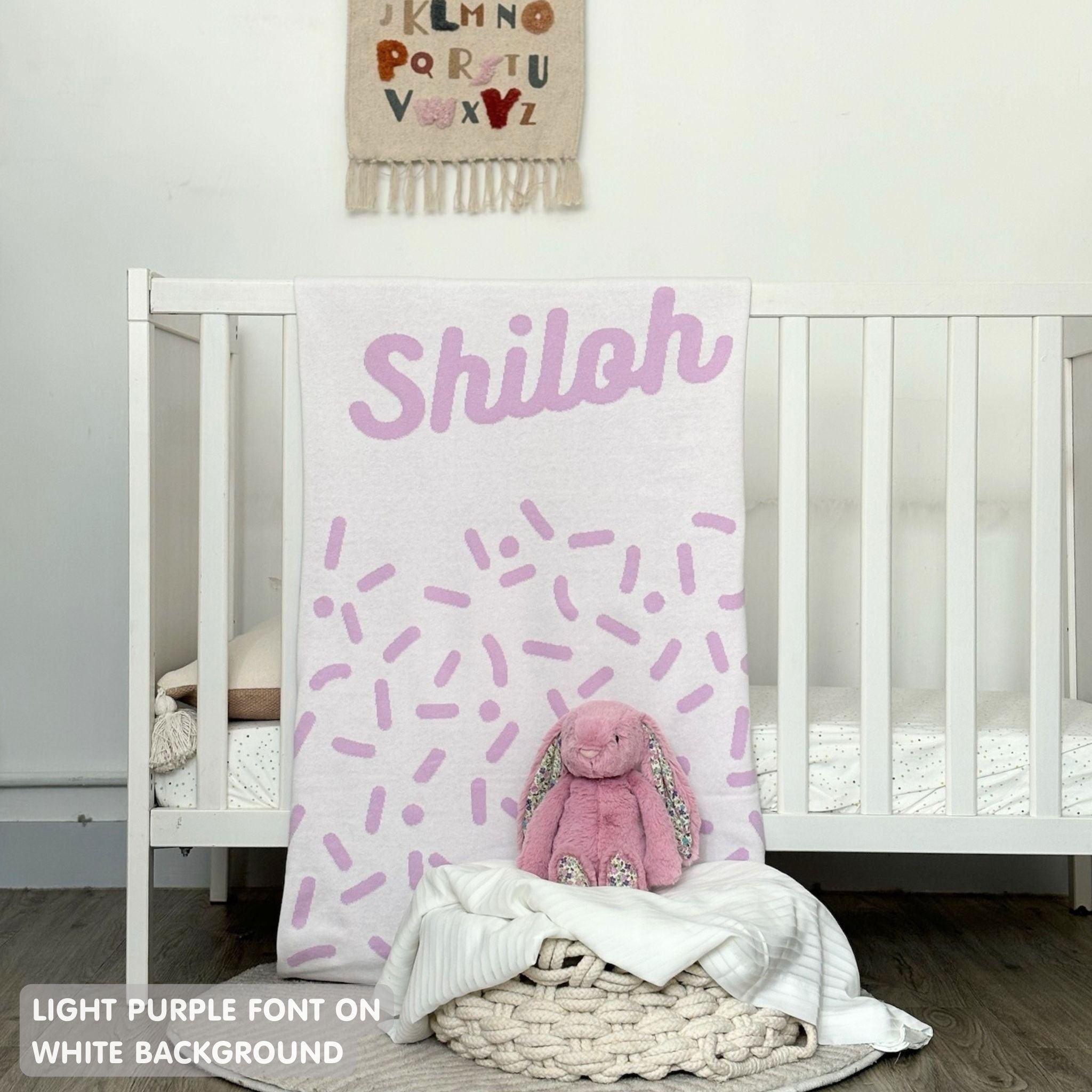 TinyBitz personalized baby knitted name blanket in white and light purple, perfect gift for birthdays and special occasions!