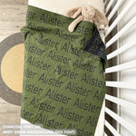 Knitted baby blanket in army green and charcoal, customised with baby's name, made by TinyBitz.
