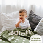 TinyBitz personalized name blanket in army green and oatmeal with dot pattern, perfect gift for newborn babies.